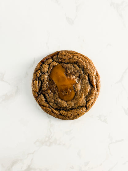 Half Three espresso toffee cookies from above, topped with golden melted toffee