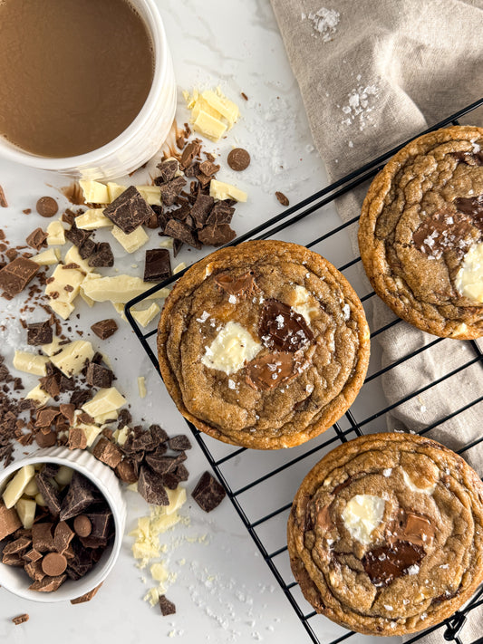 Half Three triple chocolate cookie with chopped dark, milk, and white chocolate pieces
